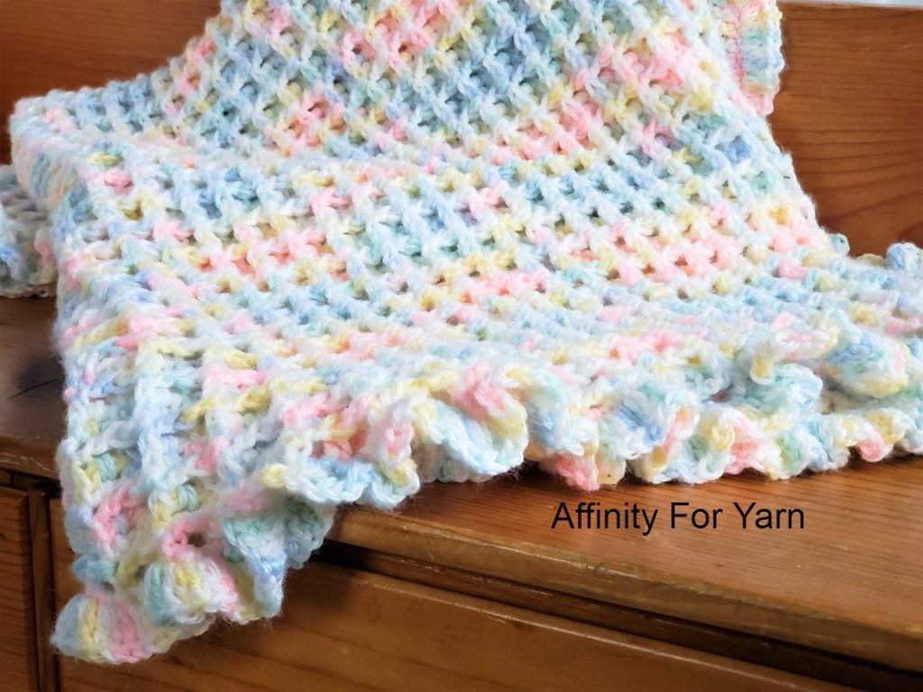 Crocheted baby quilt with Bernat baby blanket yarn